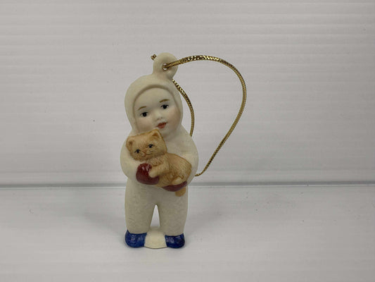 Snow Baby holding a Cat