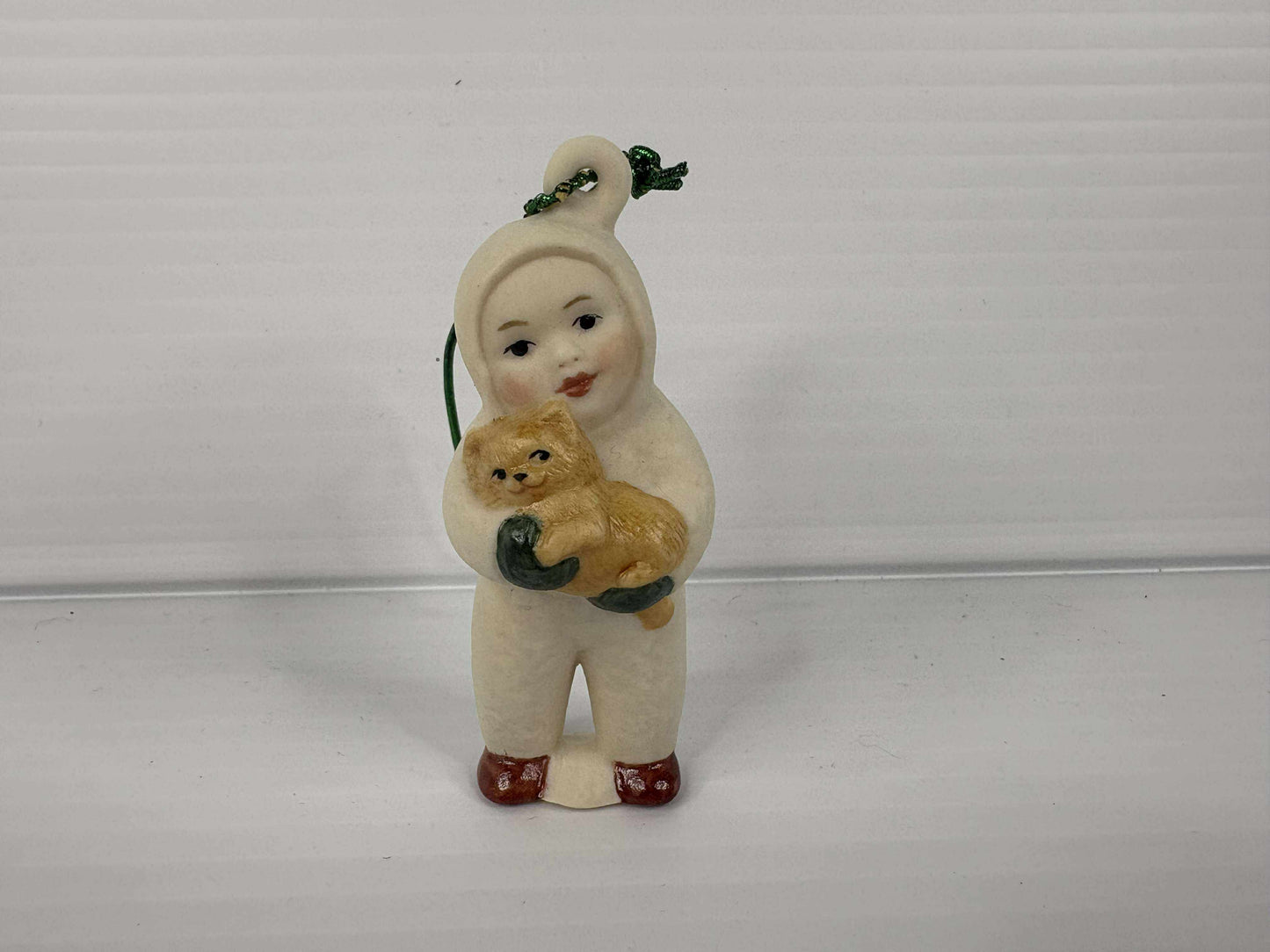 Snow Baby holding a Cat